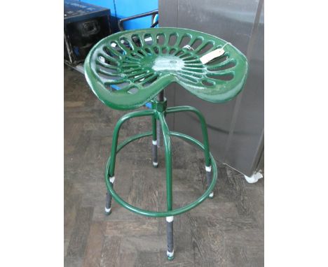 An adjustable tractor seat stool 