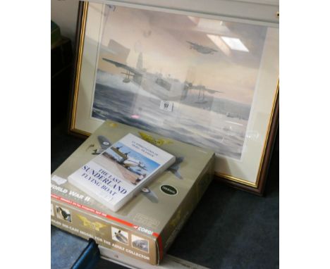 A framed print of a Sunderland Flying Boat, a Flying Boat model and a DVD 