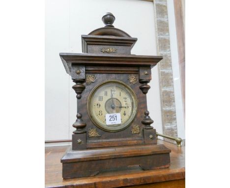 A small Edwardian bracket clock 