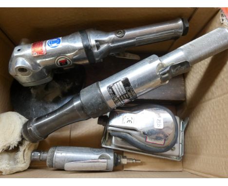 Four chrome finish compressed air tools and a socket set 