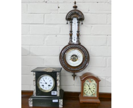 An Edwardian wall barometer, black marble clock and one other 