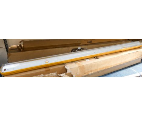 Two boxes of six new non corrosive fluorescent light fittings 