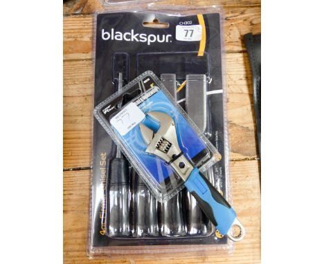 A new four piece chisel set and a new adjustable wrench 