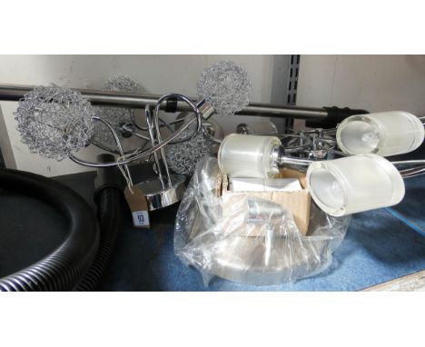 A quantity of new ceiling light fittings chrome and glass 
