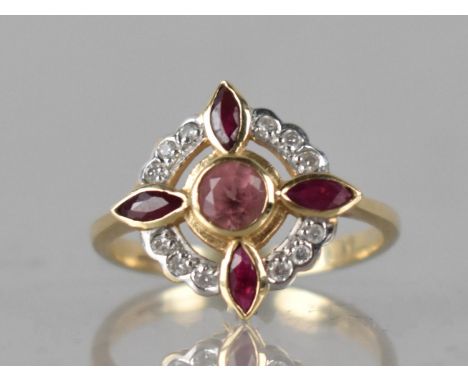 A Diamond, Pink Tourmaline and Ruby Ring by Luke Stockley in 9ct Gold, Central Round Cut Tourmaline, Bezel Set with Three Rad