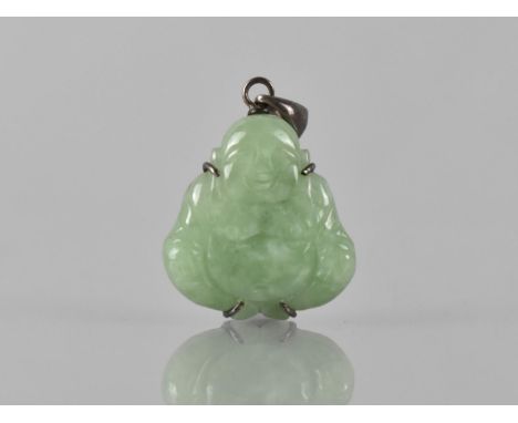 A Silver Mounted Jade Pendant, Carved as a Seated Buddha, Held in Four Silver Claws, 22mm Wide and 31mm Drop Max, Stamped to 