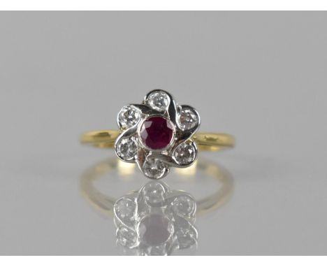 A Contemporary 18ct Gold, Platinum, Ruby and Diamond Ring, Central Collet Set Round Cut Ruby Measuring Approx 0.35ct Flanked 