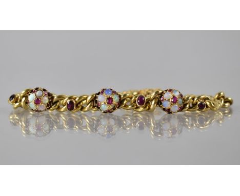 A Ruby, Opal and Gold Metal Bracelet comprising Three Raised Jewelled Roundels, Each with Central Mixed Cut Ruby, Approx 2mm 