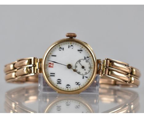 An Early 20th Century 9ct Rose Gold Wrist Watch, White Enamel Dial with Arabic Numerals and Subsidiary Seconds Hand Indicator