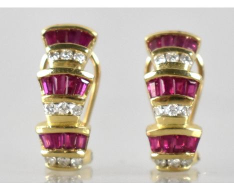 A Pair of Diamond and Ruby 14ct Gold Mounted Earrings, Three Tiered Odeonesque Design, Each Tier Comprising Four Trapezoidal 