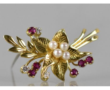 An 18ct Gold, Diamond, Ruby and Pearl Brooch, Four Pearls to Centre Flower (Approx 3mm Diameter), Six Round Cut Rubies (2.5mm