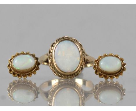 A Matched Suite of Opal and 9ct Gold Mounted Jewellery to comprise Ring and Earrings, Ring with Low Cabochon Opal Measuring 1