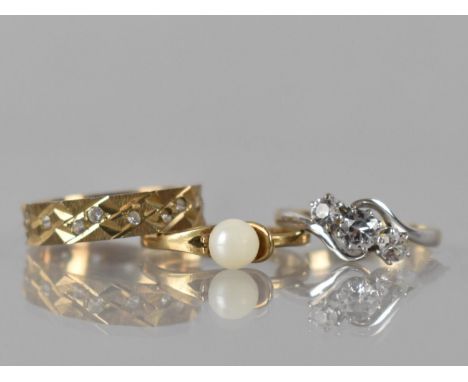 A Collection of Three 9ct Gold Rings, Trilogy Ring Mounted with Platinum and White Stones in Claw Setting to Wavy Split Shoul