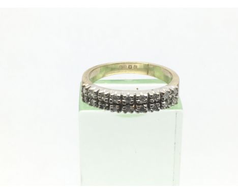 A 9ct gold half eternity ring set with two rows of diamonds, approx 2.7g and approx size L.