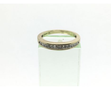 A 9ct gold diamond half eternity ring, approx.20ct, approx 2.5g and approx size M.