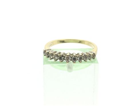 An 18ct gold diamond half eternity ring, approx .25ct, approx 2.8g and approx size N.