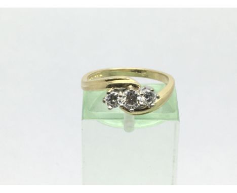 An 18ct gold three stone diamond ring, approx 1/2ct, approx 4g and approx size L.