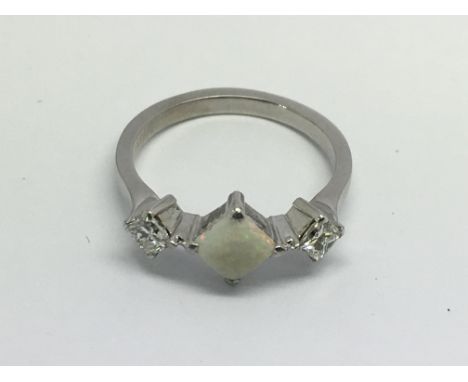 A quality 18ct white gold and opal ring, approx 3.5g and approx size L-M.