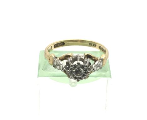 An 18ct gold ring set with a diamond, approx 2.9g and approx size K-L.