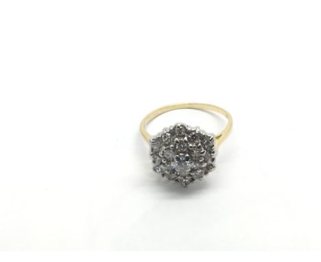 An 18ct gold diamond cluster ring, approx 1/2ct, approx 3g and approx size J-K.