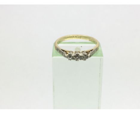 An 18ct gold and platinum diamond ring, approx 2g and approx size K.