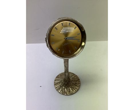 A hallmarked silver House of Lawrian half apple clock. 14cm, with original receipt.