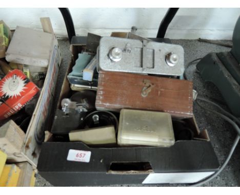 A box of camera and photographic parts including Leica Motor, Leitz Wetzlar, Motorama, light meters, filters etc