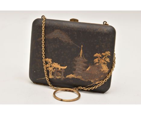 A JAPANESE DAMASCENE LADIES COMPACT, oriental scene, fitted with a chain and finger ring, opens to reveal a coin holder, brok