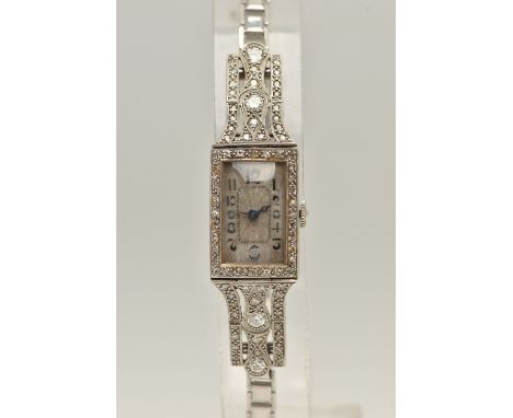 A WHITE METAL DIAMOND SET COCKTAIL WATCH, manual wind, rectangular silvered dial (discoloured), Arabic numerals, blue steel h