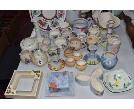 A COLLECTION OF ASSORTED E RADFORD ITEMS with various floral and geometric patterns to include four egg cups, a butter dish, 