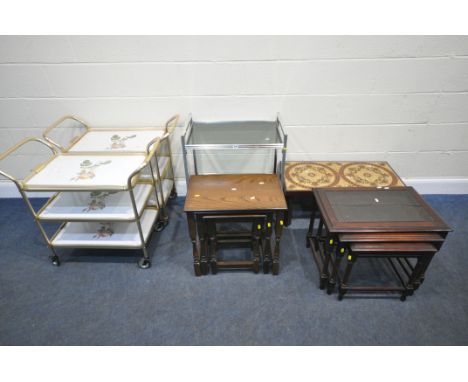 A TUBULAR METAL TWO TIER TROLLEY, with glass inserts, width 66cm x depth 41cm x height 74cm, a pair of three tier trolleys, t