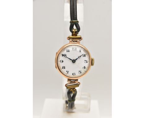 AN EARLY 20TH CENTURY 9CT GOLD LADIES WRISTWATCH, manual wind, round white dial with Arabic numerals, blue steel hands, in a 