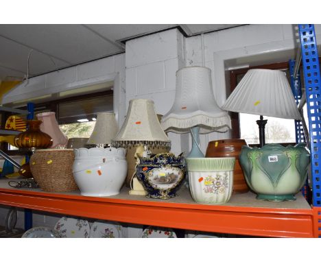 A GROUP OF ASSORTED LAMPS AND PLANTERS to include an electric table lamp in the form of an oil lamp, two wooden lamps with sh