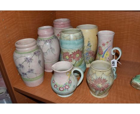 A GROUP OF RADFORD POTTERY 'PETIT POINT' TEXTURED VASES, and jugs, all painted with flowers, with rough textured bands or all