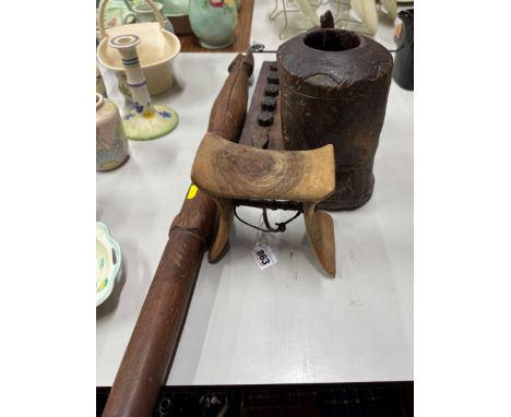 FIVE VINTAGE AFRICAN AND ASIAN ITEMS comprising a wooden neck stand with a leather carrying strap, height 16cm x width 17cm (