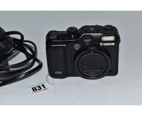 A CANON G10 DIGITAL COMPACT CAMERA, fitted with a 5x optical zoom lens 6.1-30.5mm, f2.8-4.5, 14.7 megapixels, comes with a ba