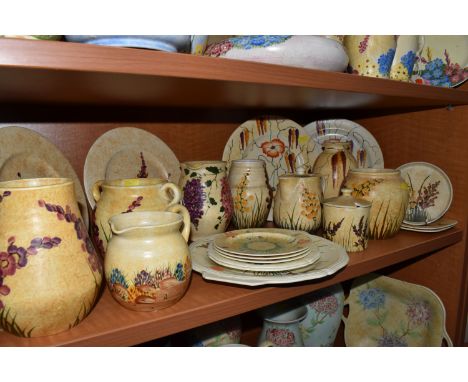 A COLLECTION OF FLORALLY PATTERNED YELLOW RADFORD ITEMS to include a group of 'ED' patterned comprising two plates (diameter 