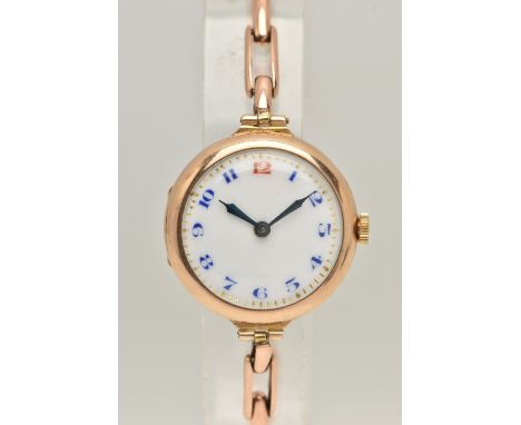 AN EARLY 20TH CENTURY LADIES 9CT GOLD WRISTWATCH, manual wind, round white dial, Arabic blue numerals and red twelve, polishe