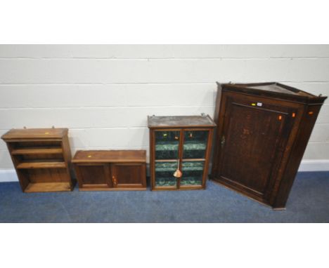 A GEORGIAN OAK CORNER CUPBOARD, the single door enclosing a painted interior, width 83cm x depth 46cm x height 111cm, a glaze