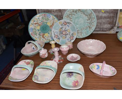 A COLLECTION OF FIFTEEN PINK AND GREEN ART DECO E RADFORD ITEMS in various floral patterns to include two candlesticks, five 