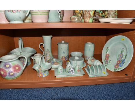 A COLLECTION OF RADFORD POTTERY WARES, in Aster and similar patterns on mint green grounds, to include a cruet set (staining 