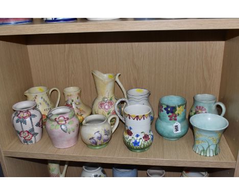 A COLLECTION OF ELEVEN SMALL RADFORD VASES AND JUGS to include a pink 'MA' patterned vase (height 14cm), a 'HU' pattern yello