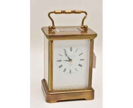 A 'MATTHEW NORMAN' CARRIAGE CLOCK, white Roman numeral dial signed 'Matthew Norman, London', missing key, approximate height 
