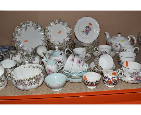 A COLLECTION OF TEAWARE, a Crescent China  9185 pattern tea set, decorated with Michaelmas Daisies comprising a slop bowl, ca