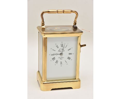 A FRENCH BRASS CARRIAGE CLOCK, white Roman numeral dial signed 'L' Epee Fondee en 1839, Sainte Suzanne France', together with