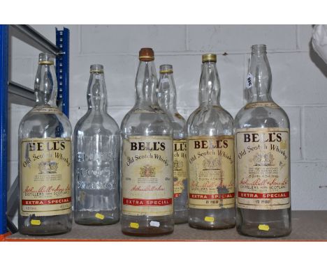 A COLLECTION OF SIX 4.5 LITRE BELL'S OLD SCOTCH WHISKY BOTTLES, height 52cm, one bottle is missing paper label, other labels 