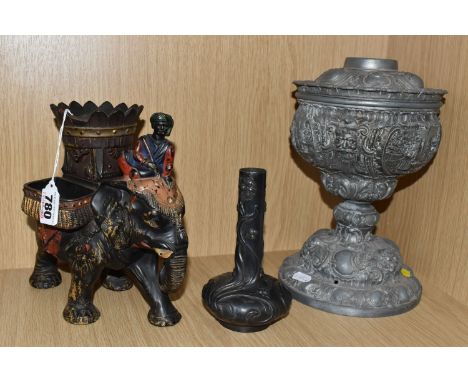 THREE DECORATIVE ITEMS to include a pewter art nouveau floral repousse patterned bud vase with a bulbous base, height 16cm (s