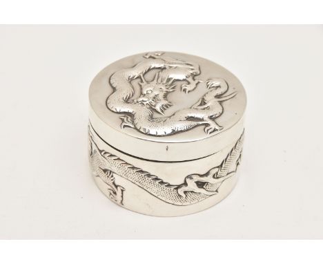 A CHINESE CIRCULAR BOX, polished box with embossed dragon to the cover and sides, worn gilt interior, stamped to the base WH9