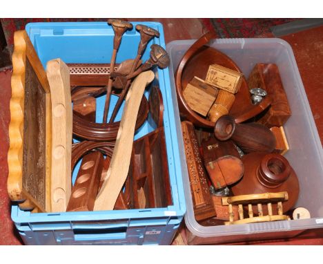 Two boxes of mixed wooden items including candlesticks, oriental trinket boxes, candle holders, a tray, ornaments etc.