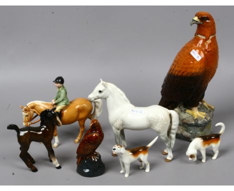 A Beswick Beneagles Scotch whisky decanter along with a Beswick white mare, chestnut foal, two hunt hounds one damaged and a 